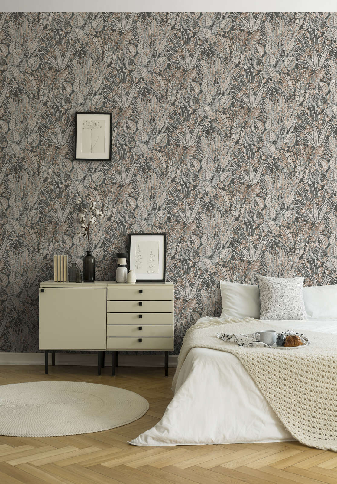 The Ranunculus Arbour | Warm Beige & Deep Black Luxe wallpaper shown hung on a styled interior wall (official room photo)