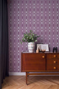 The Fretwork Colonnade | Cream & Violet Luxe wallpaper shown hung on a styled interior wall