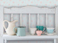 The Lupin Conservatory | Azure & Blush Luxe wallpaper shown hung on a styled interior wall (official room photo)