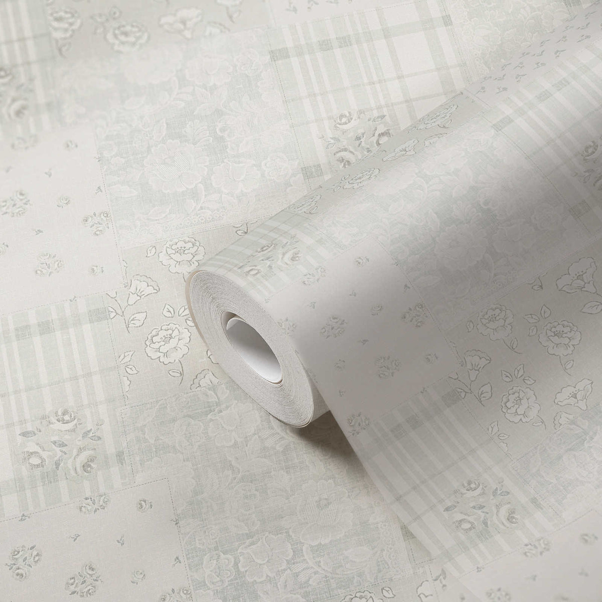 Roll of The Trillium Bower | Cream & Smoked Grey Luxe partly unrolled, 0.53 m × 10.05 m