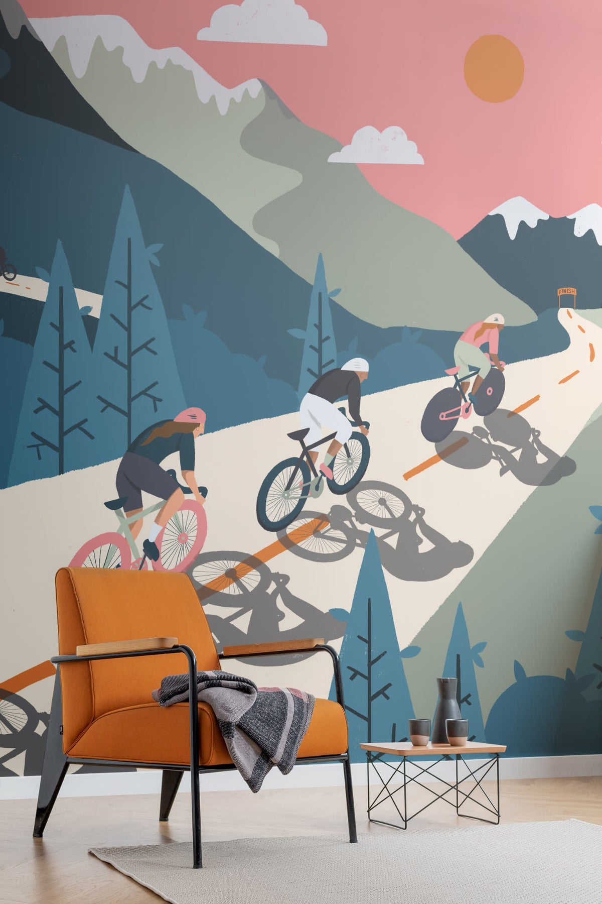 The Alpine Peloton mural in coral and deep teal in a living room