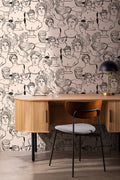 The Antiquity Salon wallpaper in parchment beige behind a desk in a home office