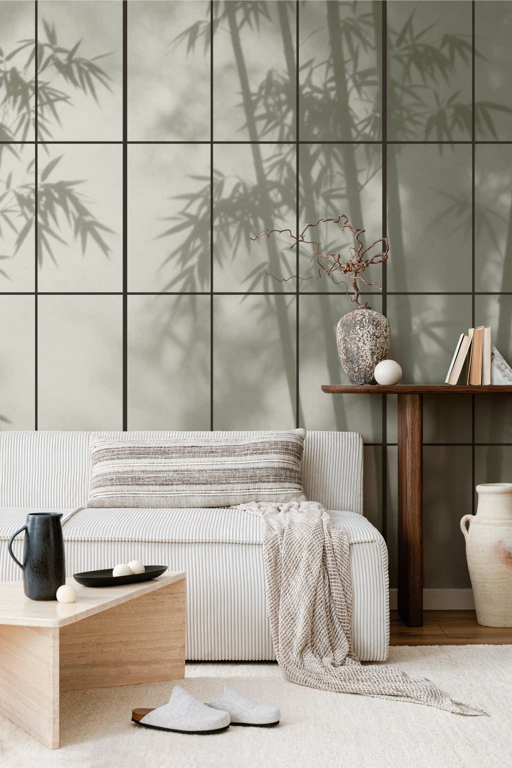 The Bamboo Teahouse mural in misty moss green behind the bed in a bedroom