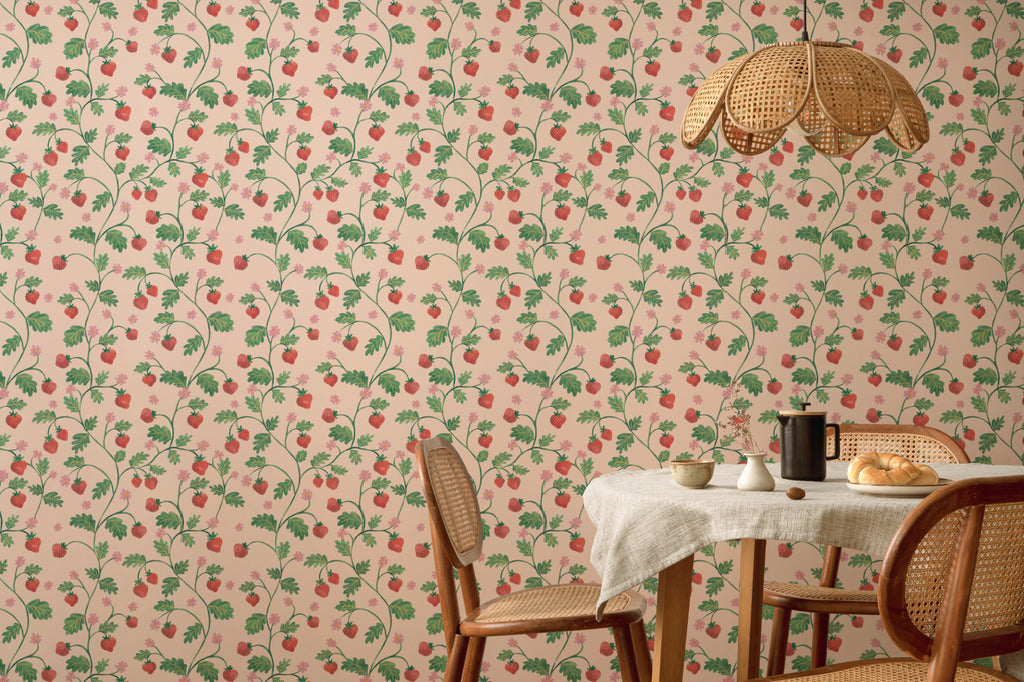 The Berry Arbour wallpaper in blush beige behind a dining table