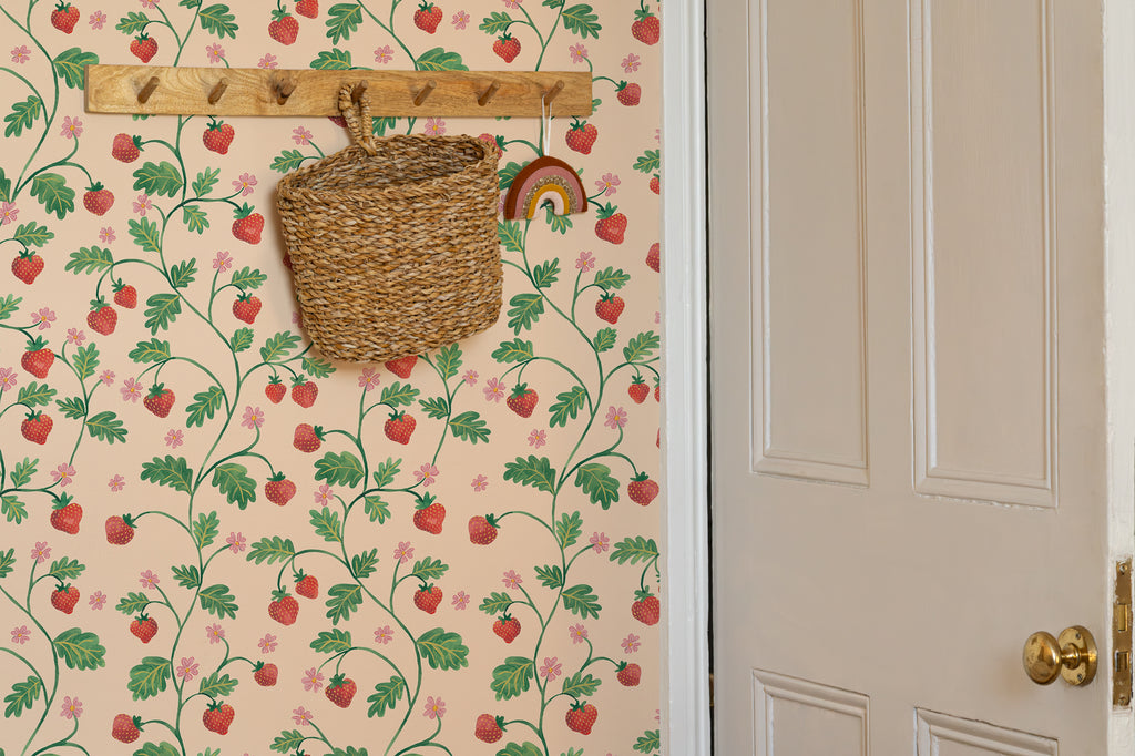 The Berry Arbour wallpaper in blush beige in a hallway