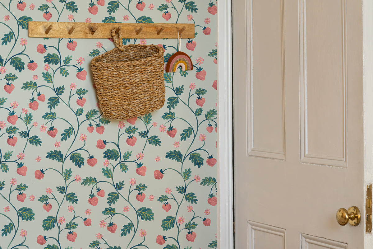 The Berry Arbour wallpaper in pale sky blue in an entryway