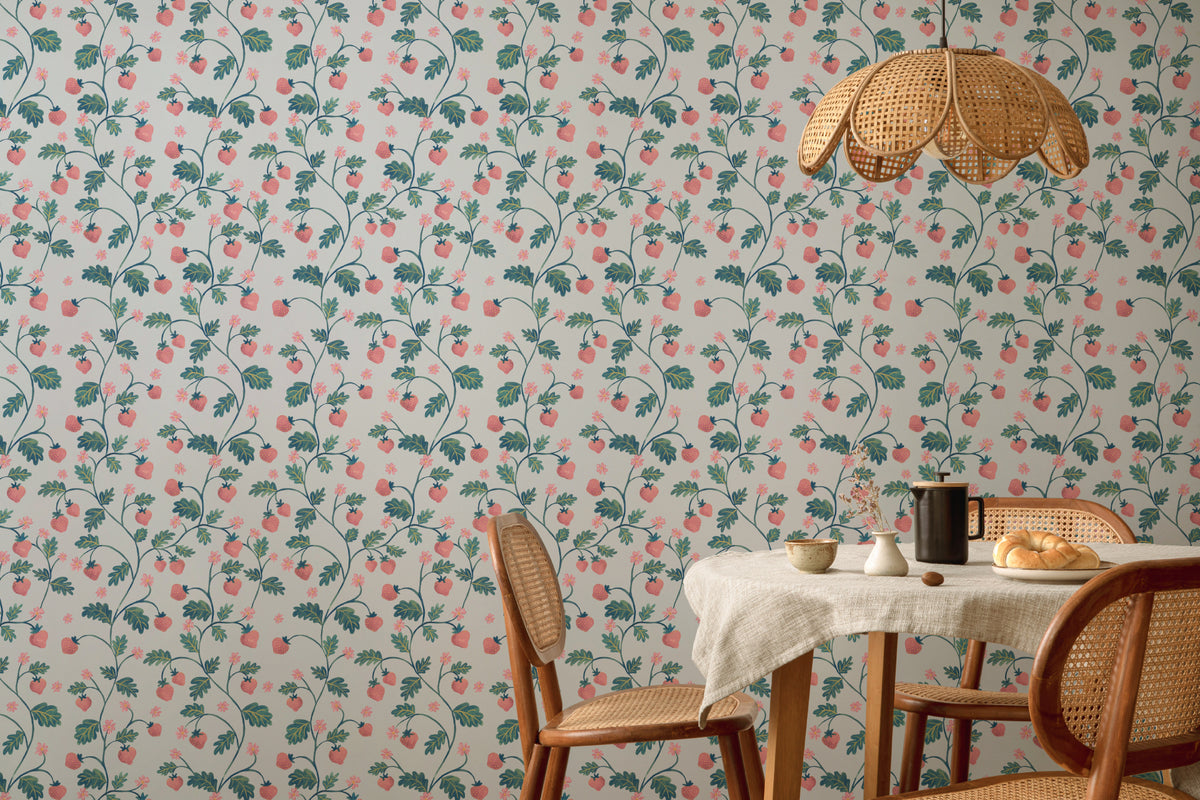 The Berry Arbour wallpaper in pale sky blue behind a dining table