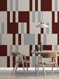 The Block Parquetry mural in burgundy and mocha behind a dining table