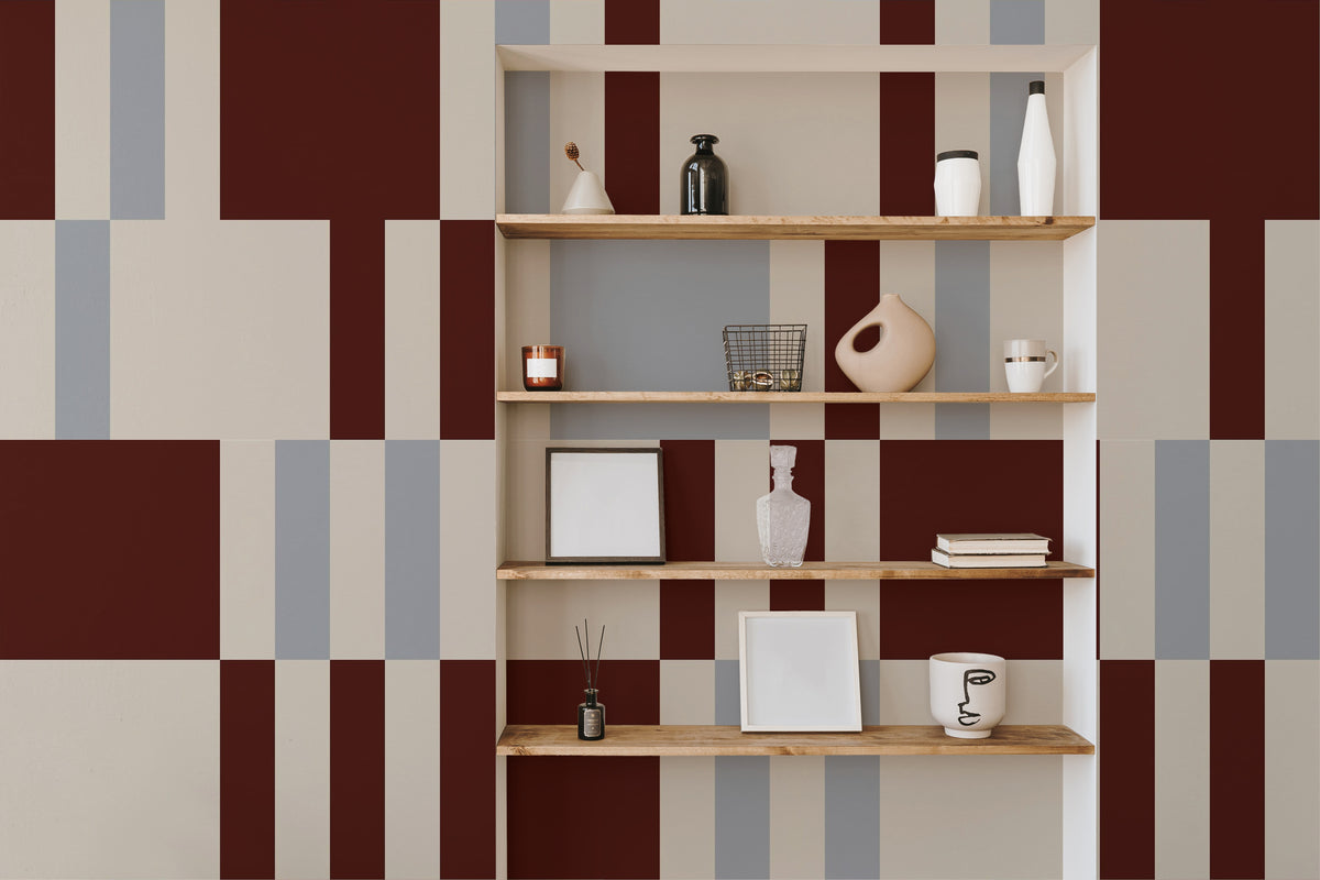 The Block Parquetry mural in burgundy and mocha behind a styled console