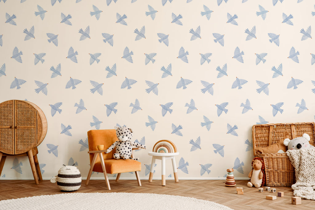 The Bluebird Flight wallpaper in cornflower blue on a nursery wall