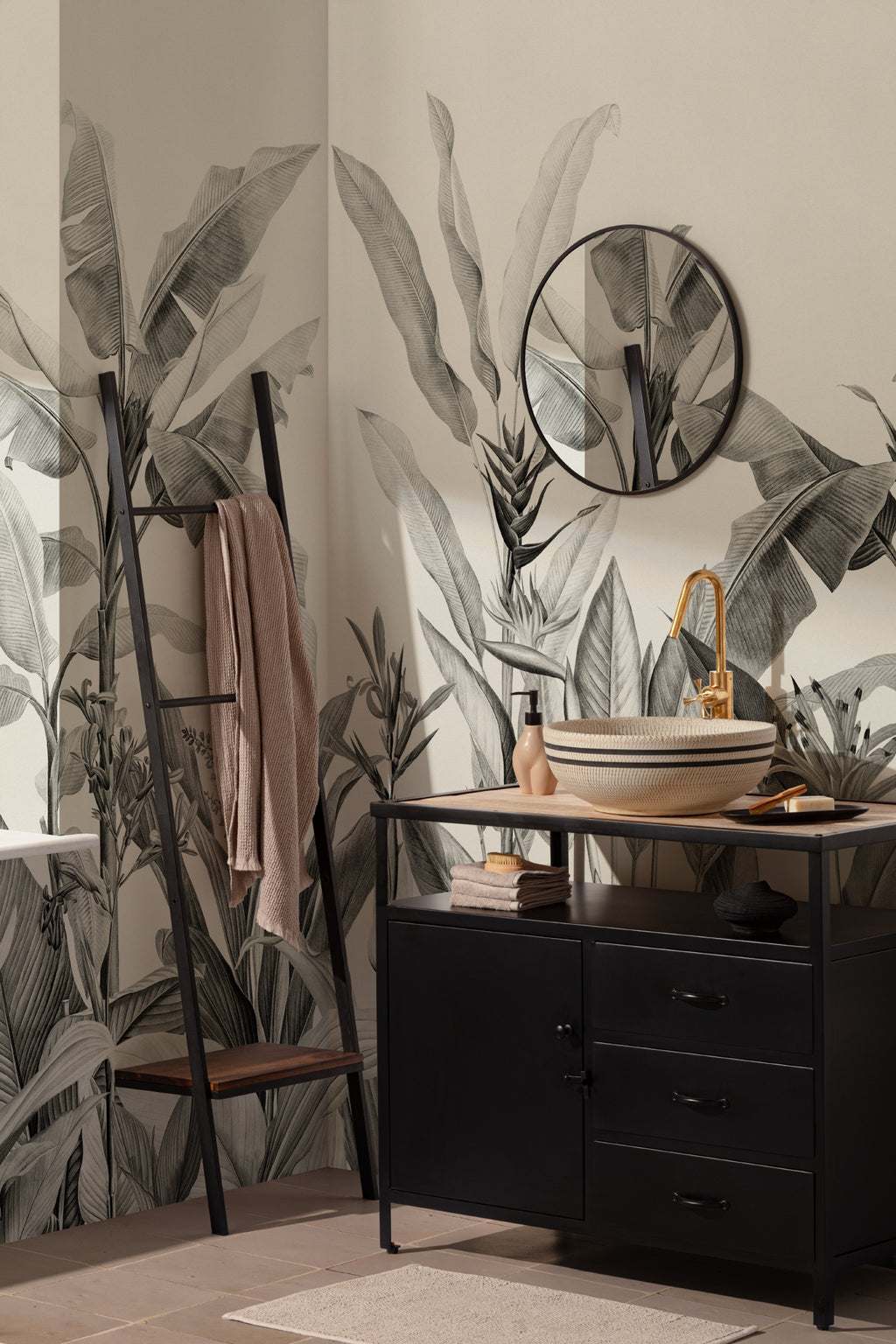 The Botanic Frieze mural in charcoal and white behind a styled console