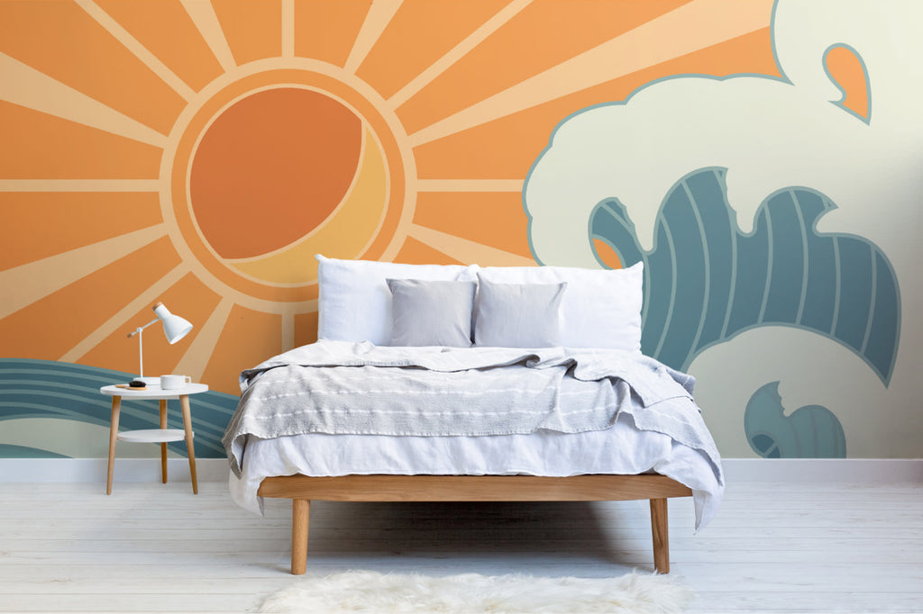 The Breakwater Sun mural in tangerine and teal in a calm bedroom setting