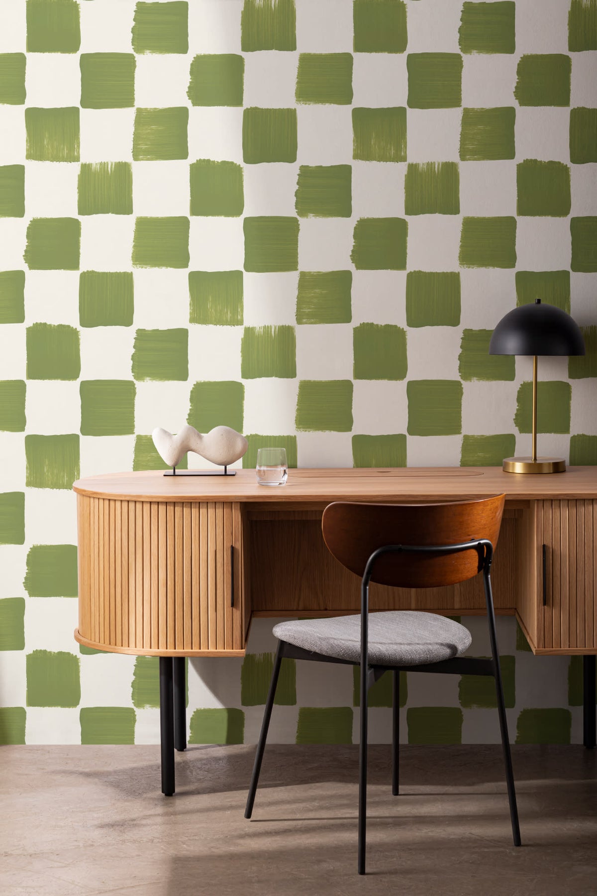 The Brushstroke Chequer wallpaper in olive moss in a study corner with a desk