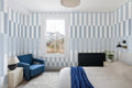 The Cabana Block mural in ice blue in a living room