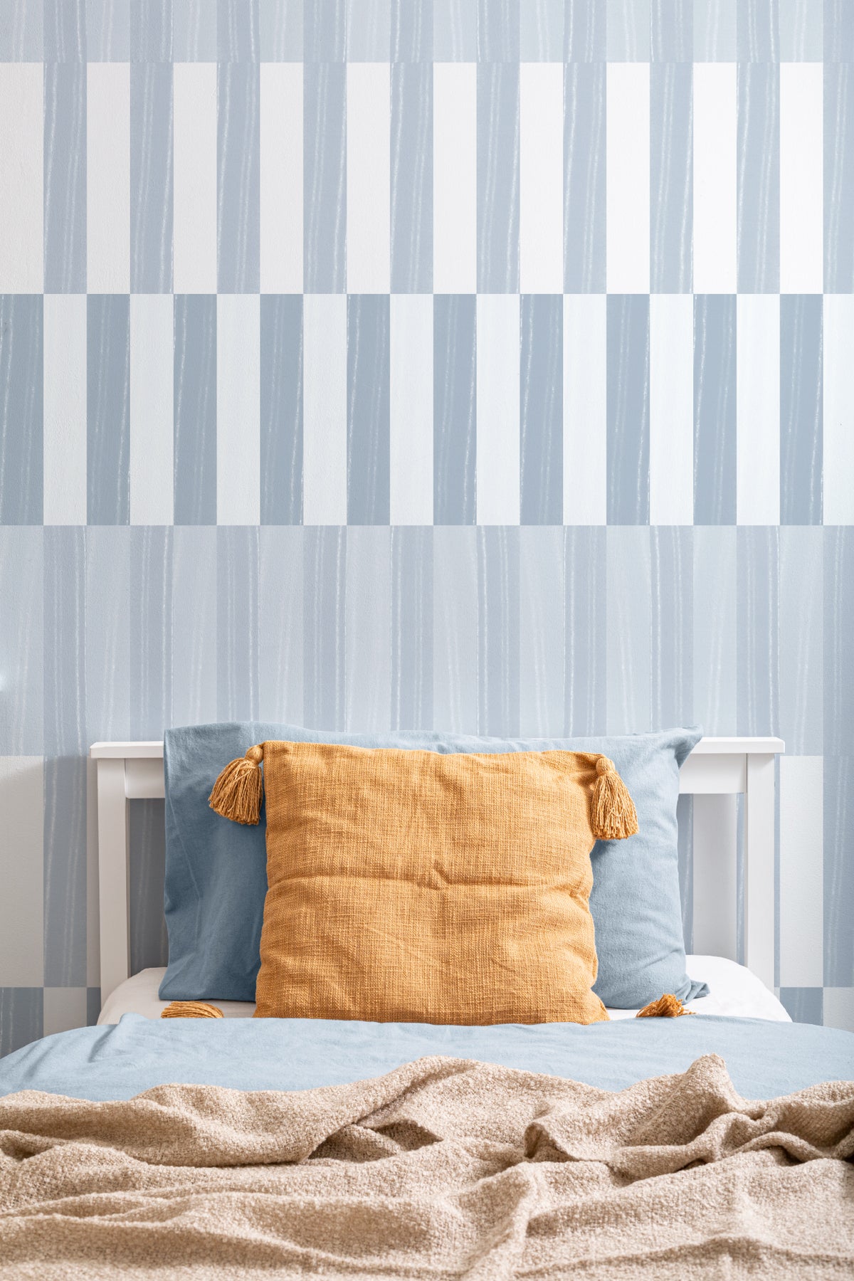The Cabana Block mural in ice blue behind a kids' play corner