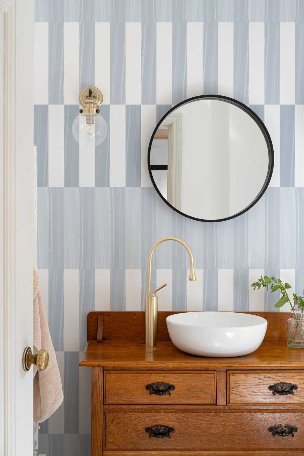 The Cabana Block mural in ice blue in a bathroom