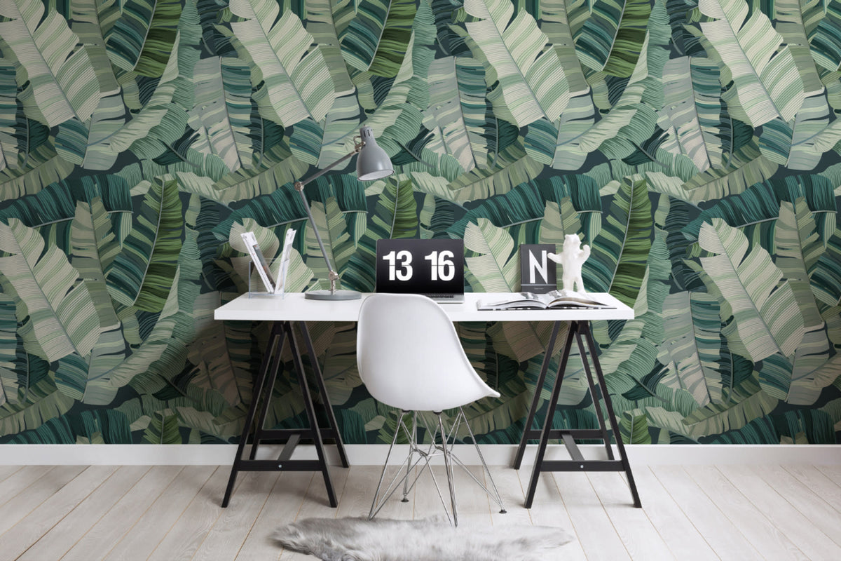 The Canopy Layers mural in lush green behind a desk in a home office
