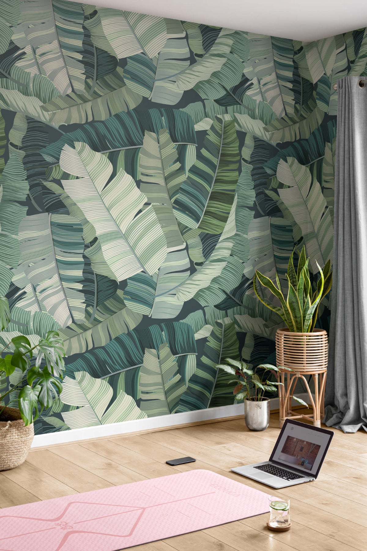 The Canopy Layers mural in lush green behind a styled console