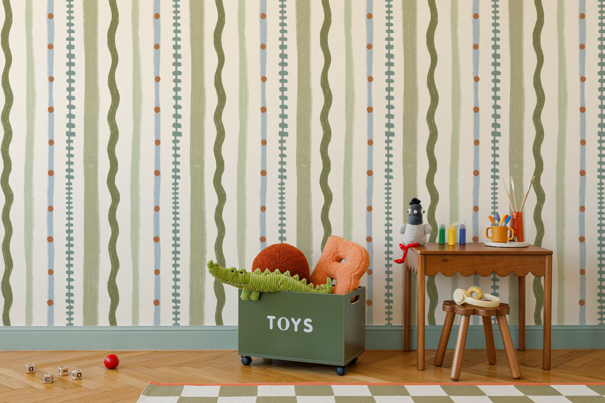 The Carousel Stripe mural in fern green and sand in a child's bedroom
