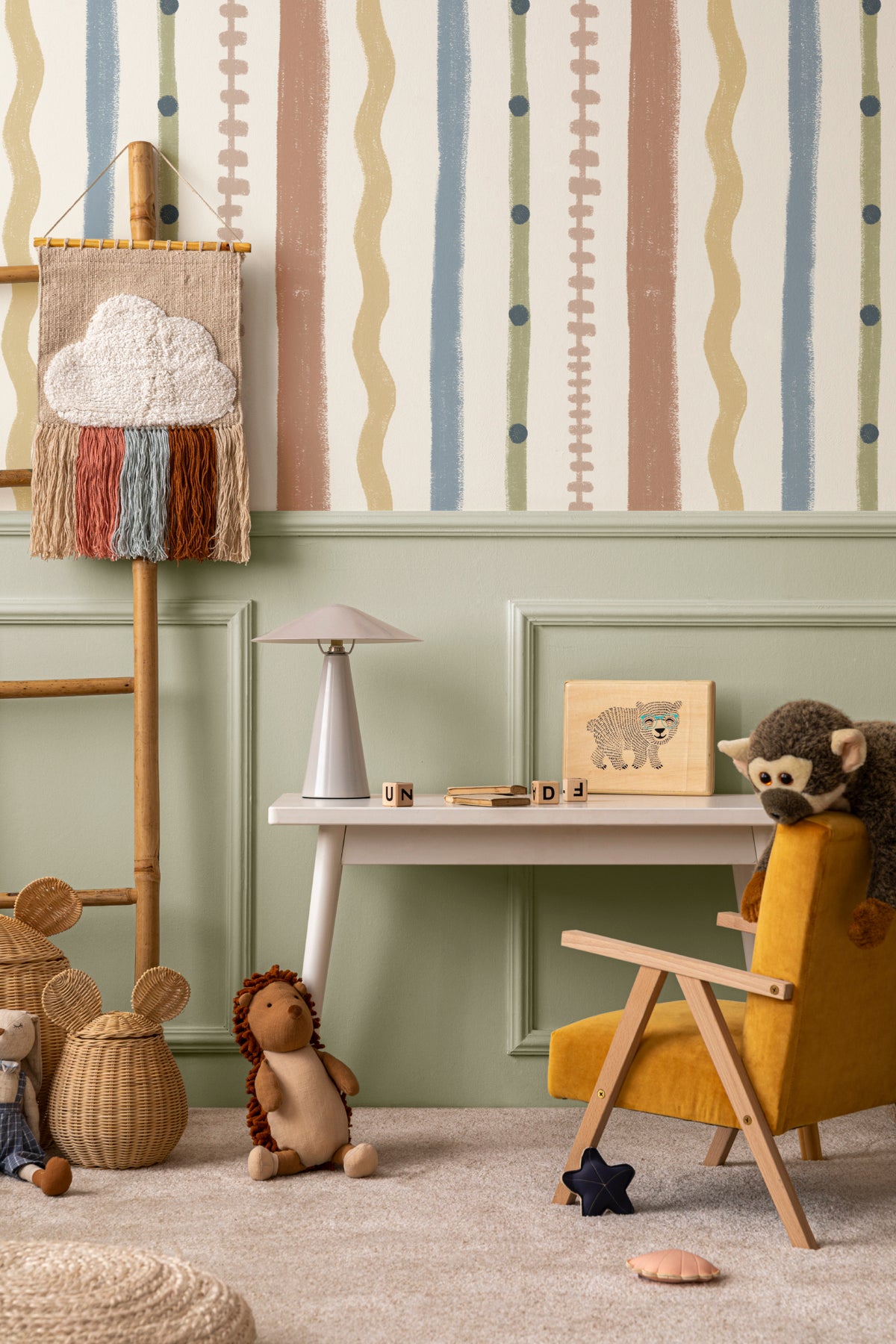 The Carousel Stripe mural in mustard and sky blue in a children's room setting