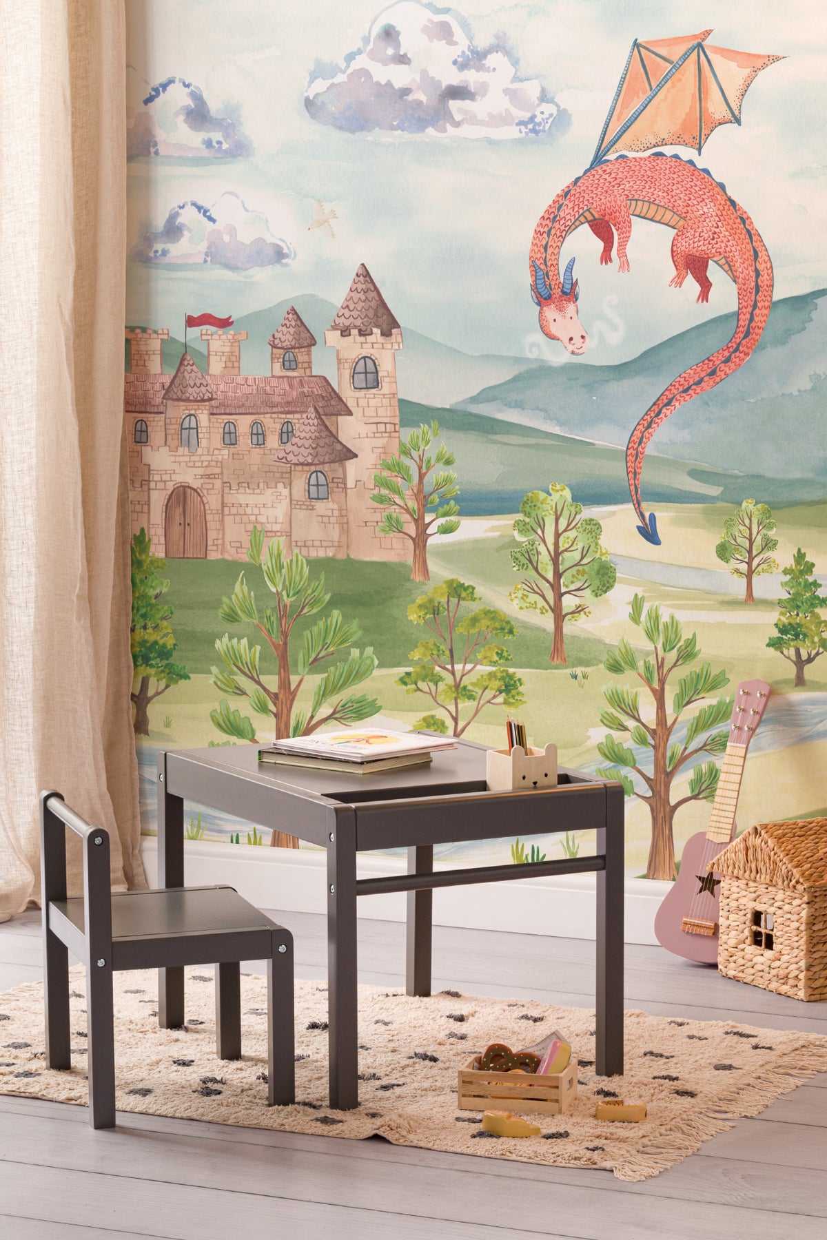 The Castle Storybook mural in dawn blue and meadow green in a children's room setting, another angle