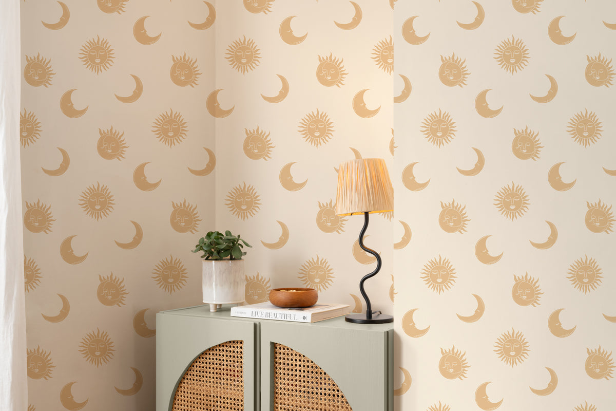 The Celestial Orangery wallpaper in honey yellow as a backdrop to styled furniture