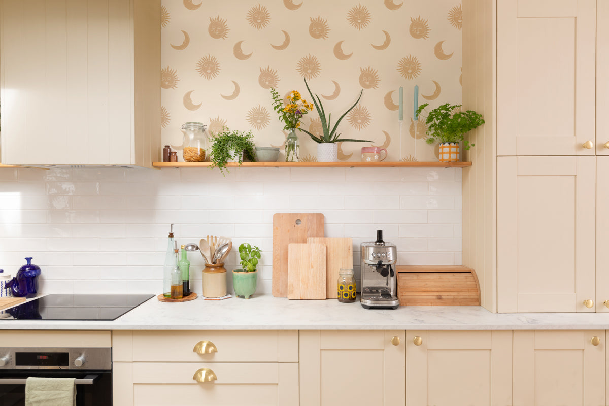 The Celestial Orangery wallpaper in honey yellow in a kitchen