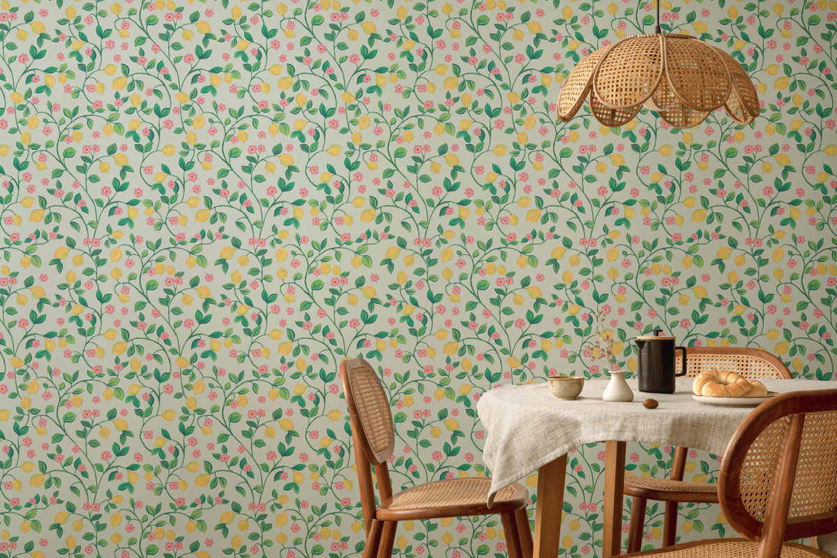 The Citrus Grove wallpaper in pale aqua behind a dining table
