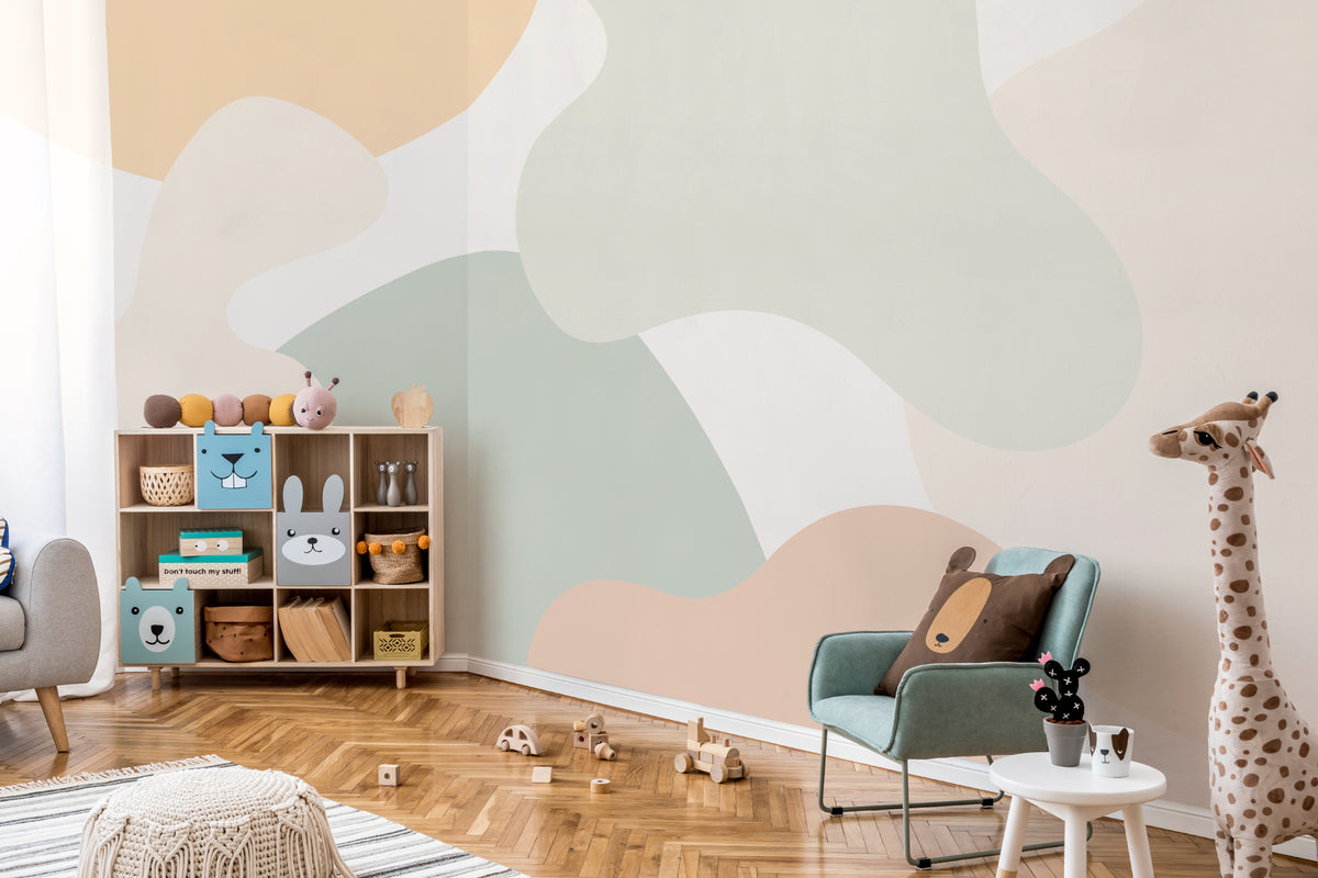 The Cloud Hills mural in sage and apricot on a nursery wall