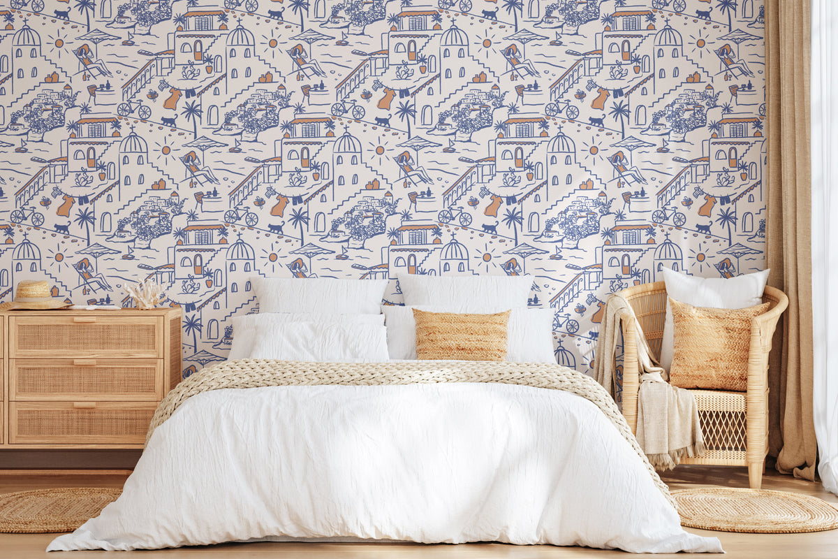 The Coastline Terrace wallpaper in cobalt blue behind the bed in a bedroom