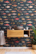The Curio Aquarium mural in coral and ink behind a styled console