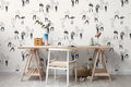 The Dancehall Sketch wallpaper in ink black and cream behind a desk in a home office