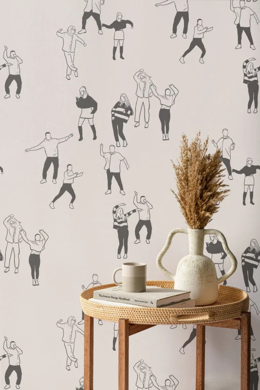 The Dancehall Sketch wallpaper in ink black and cream behind a styled console