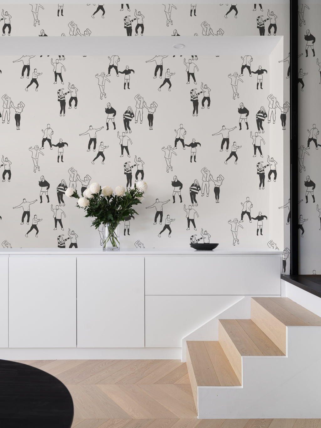 The Dancehall Sketch wallpaper in ink black and cream in a hallway