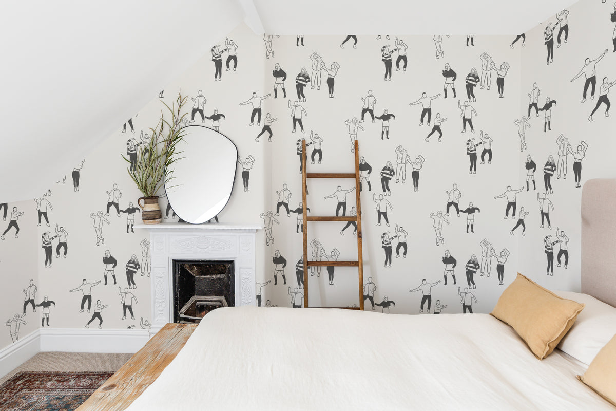 The Dancehall Sketch wallpaper in ink black and cream in a calm bedroom setting