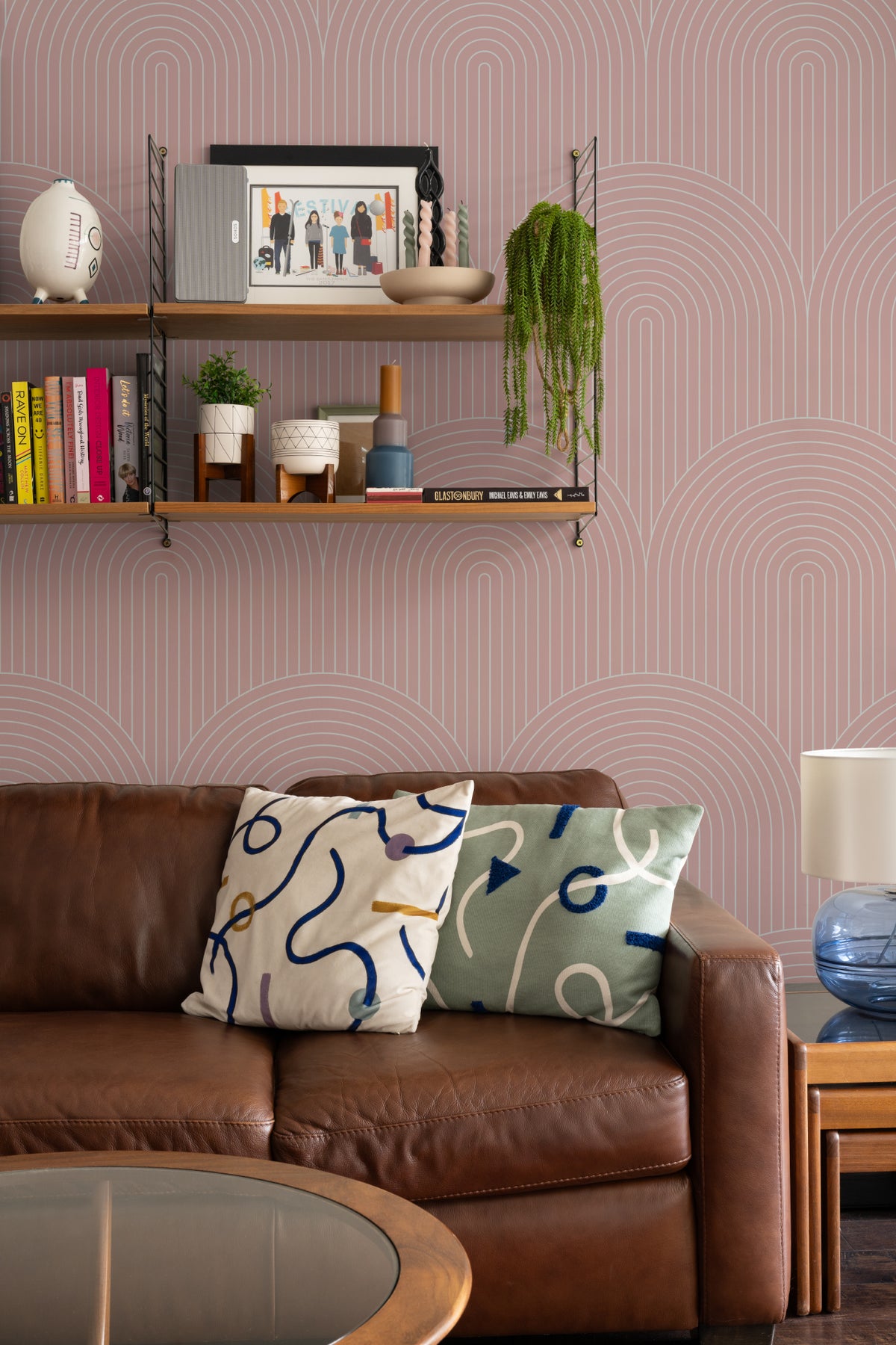 The Deco Archway wallpaper in dusty rose in a lounge setting