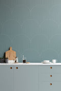 The Deco Archway wallpaper in teal green in a kitchen