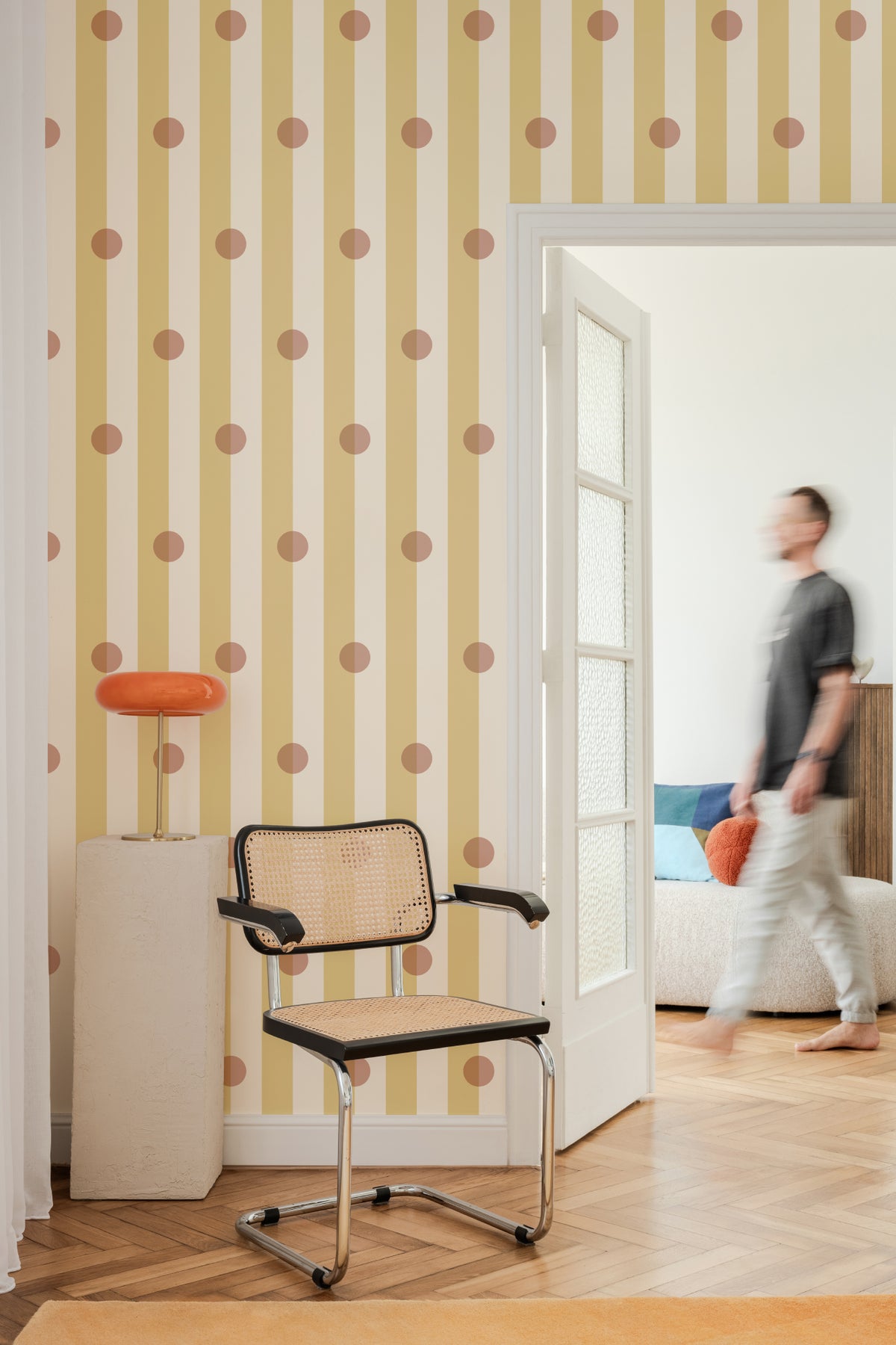 The Dotted Awning mural in primrose and blush in a hallway