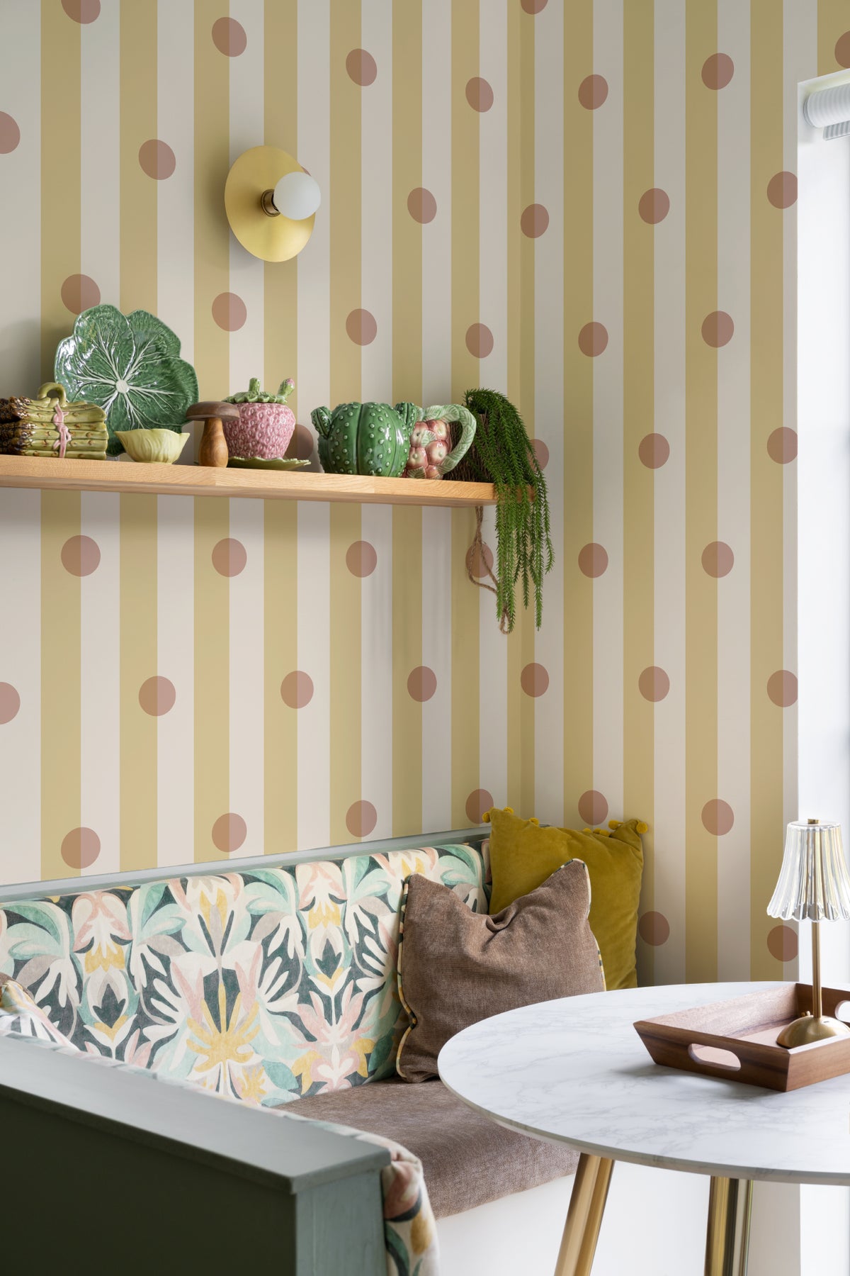 The Dotted Awning mural in primrose and blush in a dining room