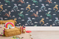 The Dragon Skies wallpaper in midnight navy on a nursery wall