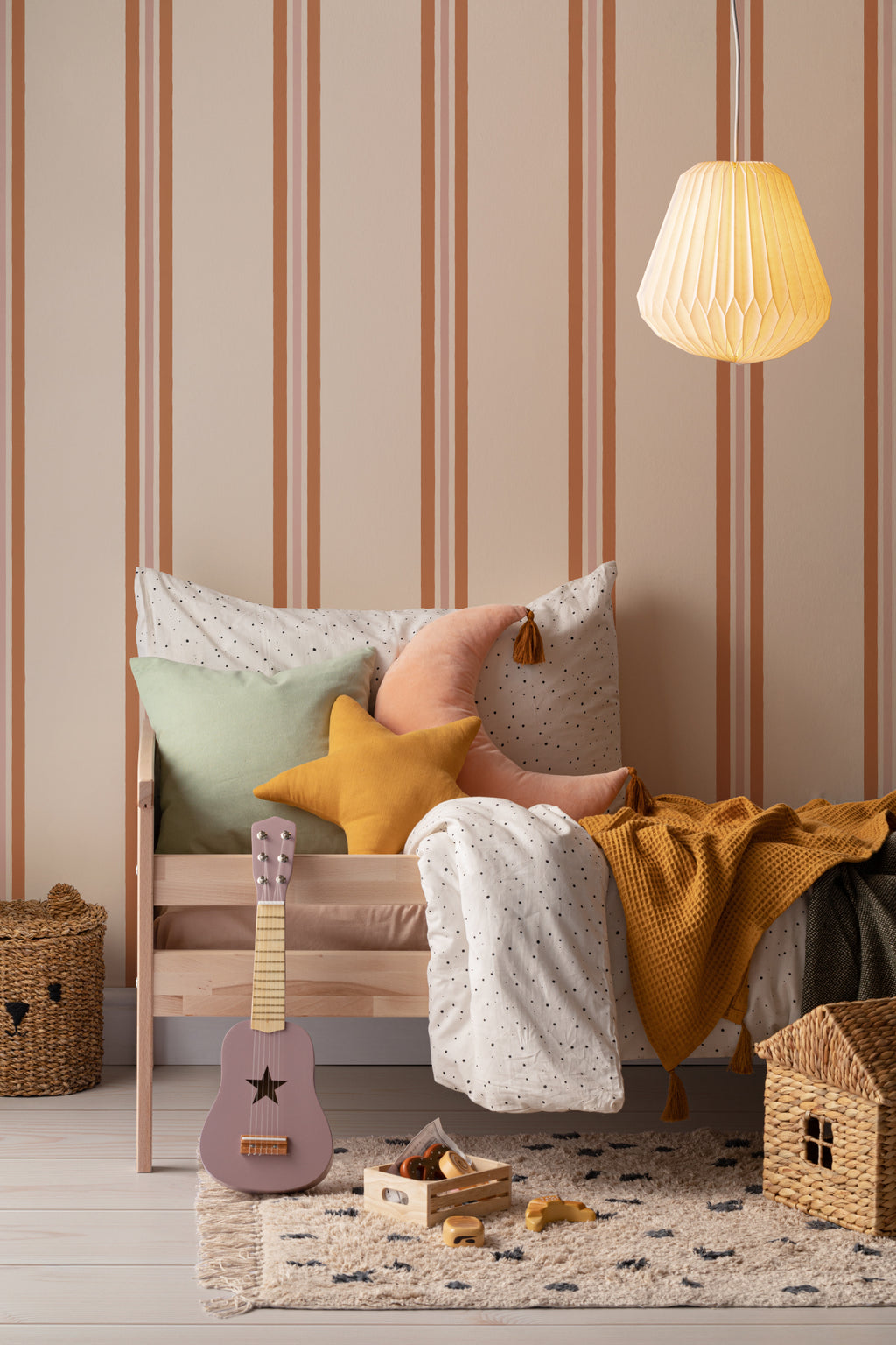 The Draughtsman Stripe wallpaper in burnt orange in a living room