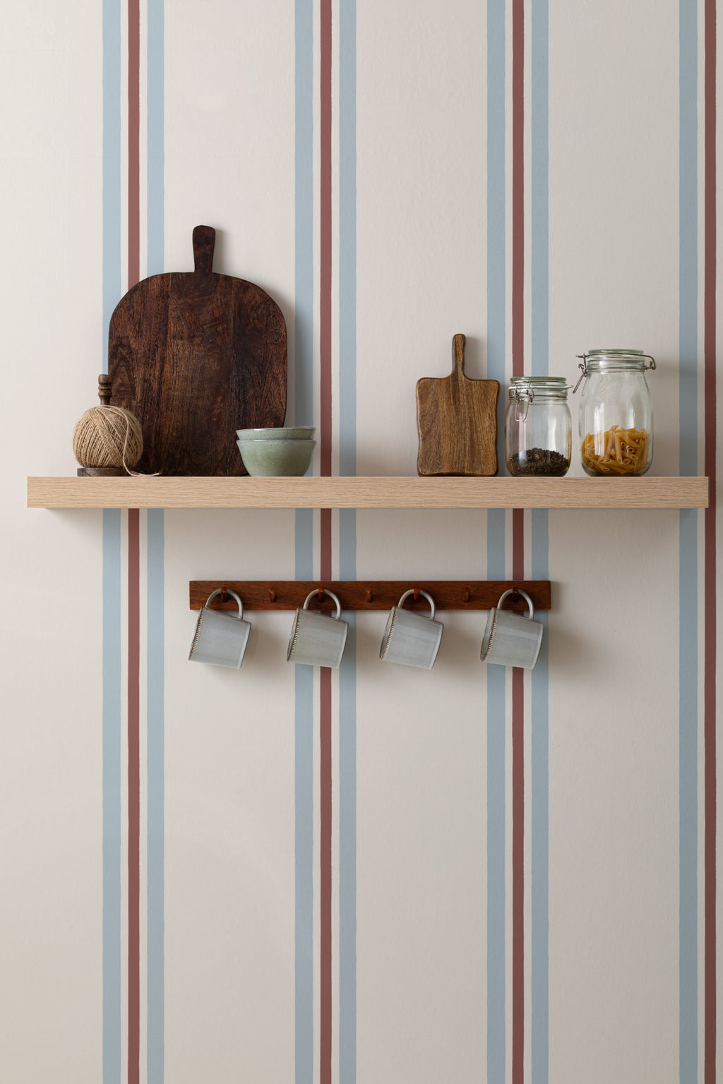 The Draughtsman Stripe wallpaper in sky blue in a hallway