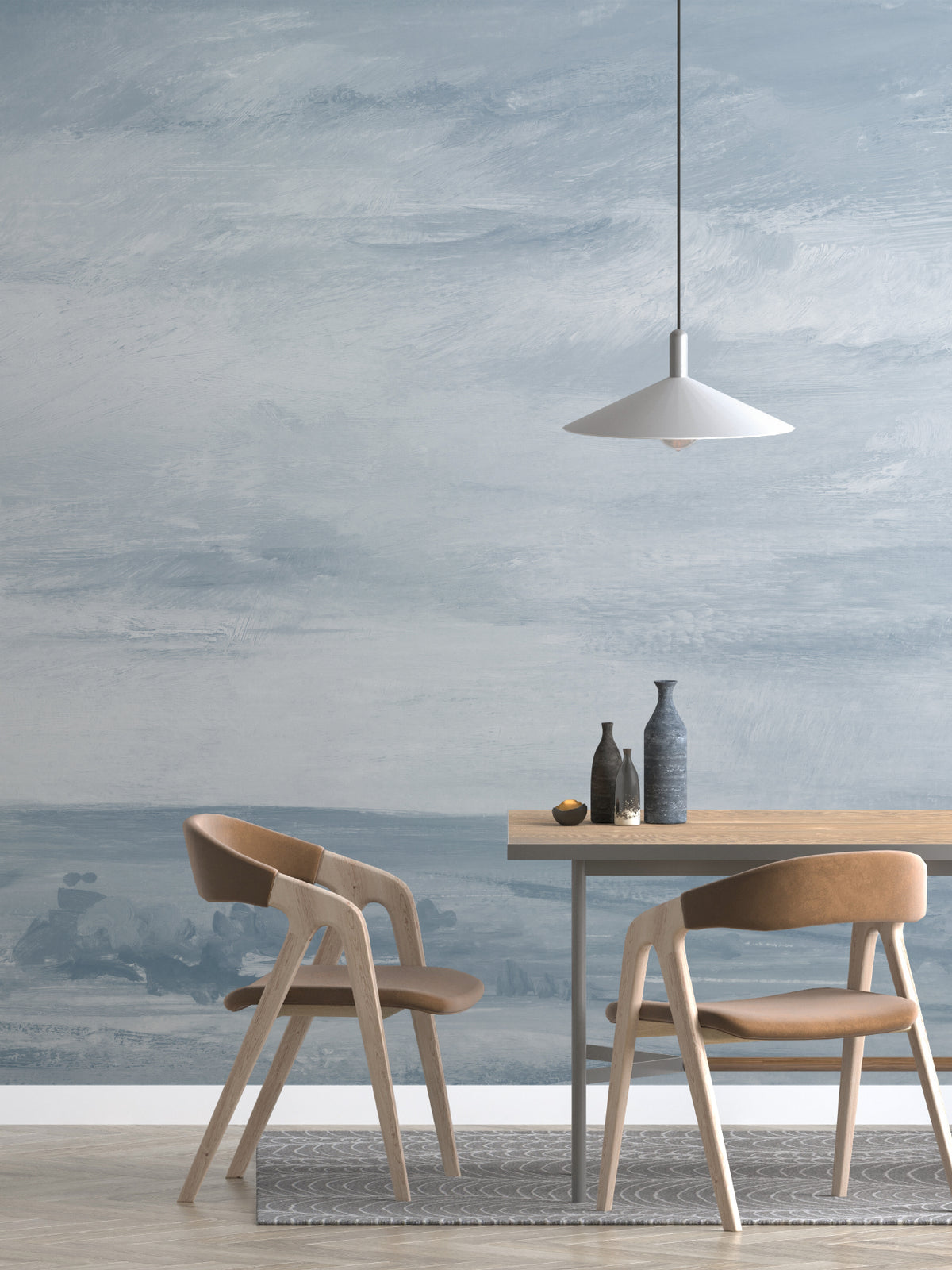 The Estuary Reverie mural in hazy blue behind a dining table
