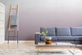 The Evening Veil mural in deep plum in a living room