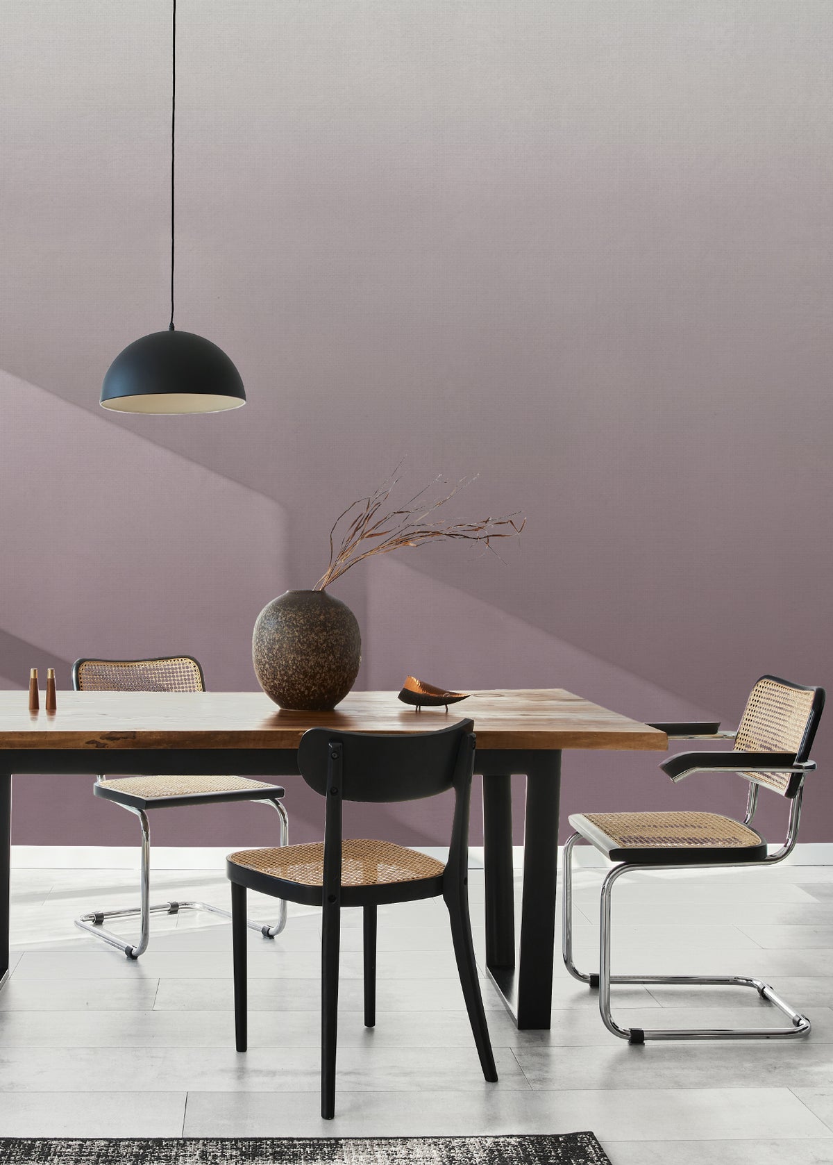 The Evening Veil mural in deep plum behind a dining table