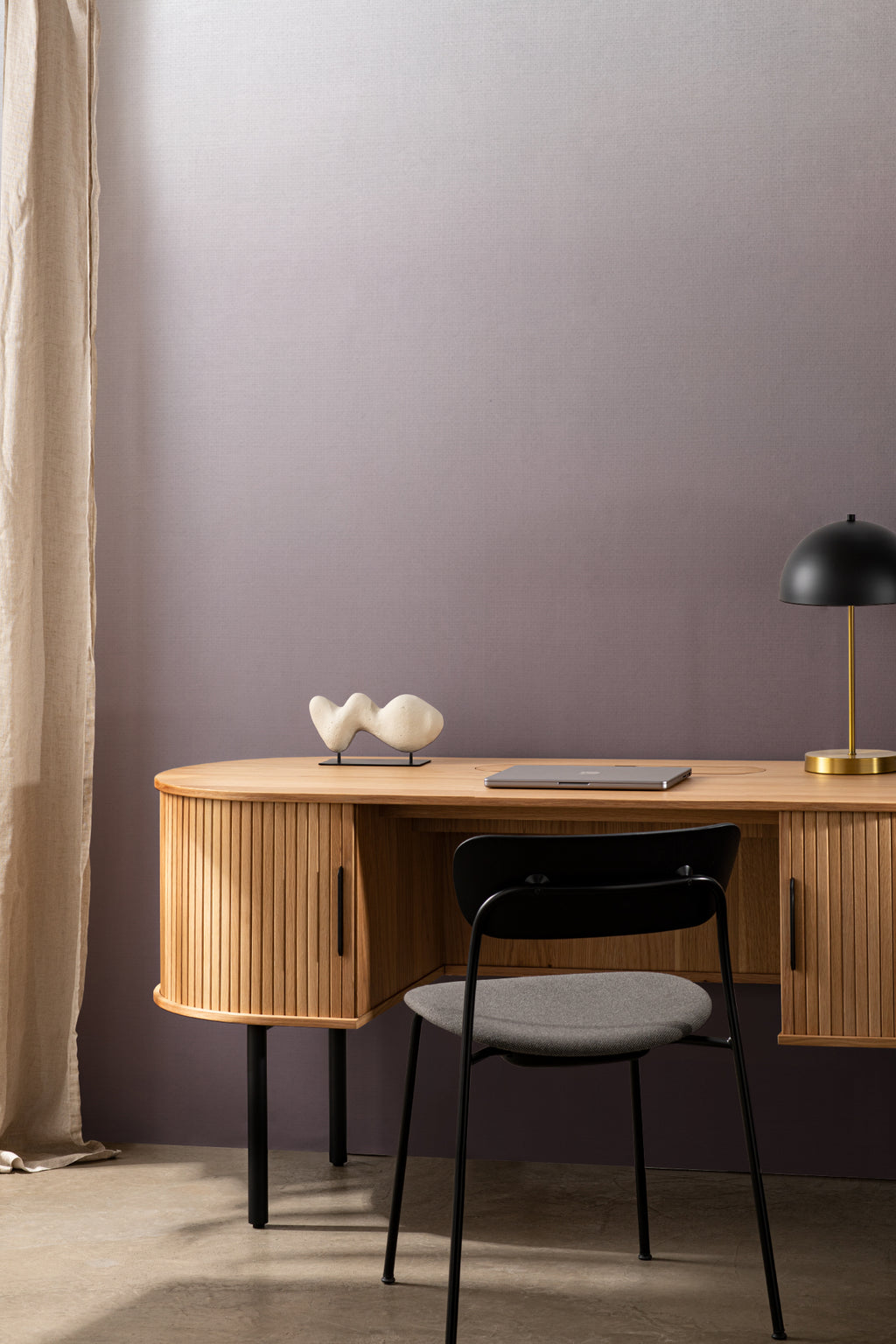 The Evening Veil mural in deep plum behind a desk in a home office