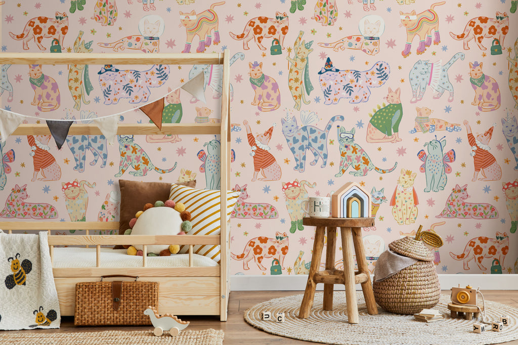 The Feline Wardrobe mural in candy pink in a children's room setting