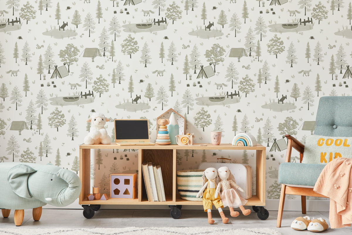 The Firelight Woods wallpaper in sage green in a children's room setting, another angle