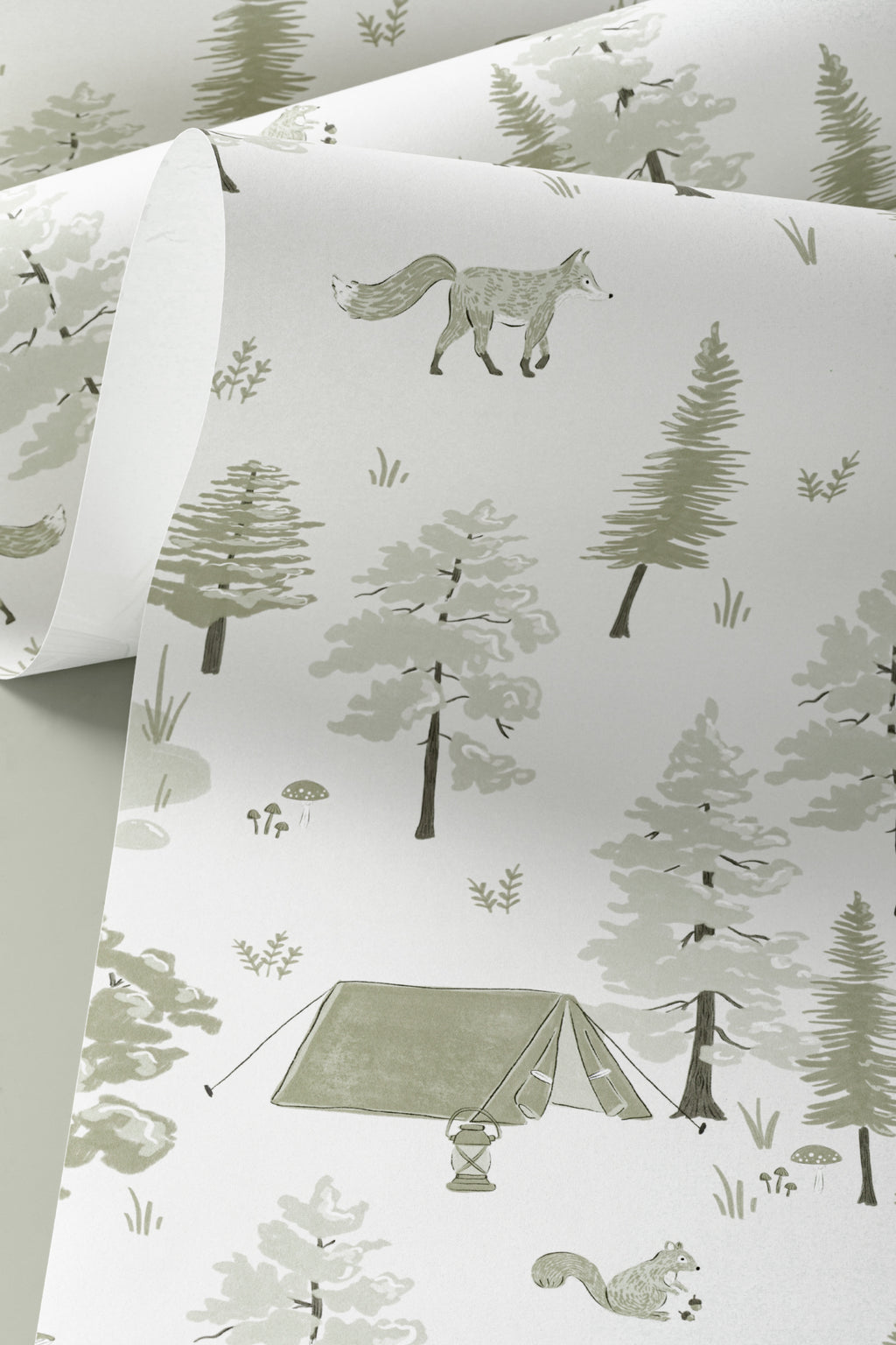 Angled detail of The Firelight Woods wallpaper in sage green