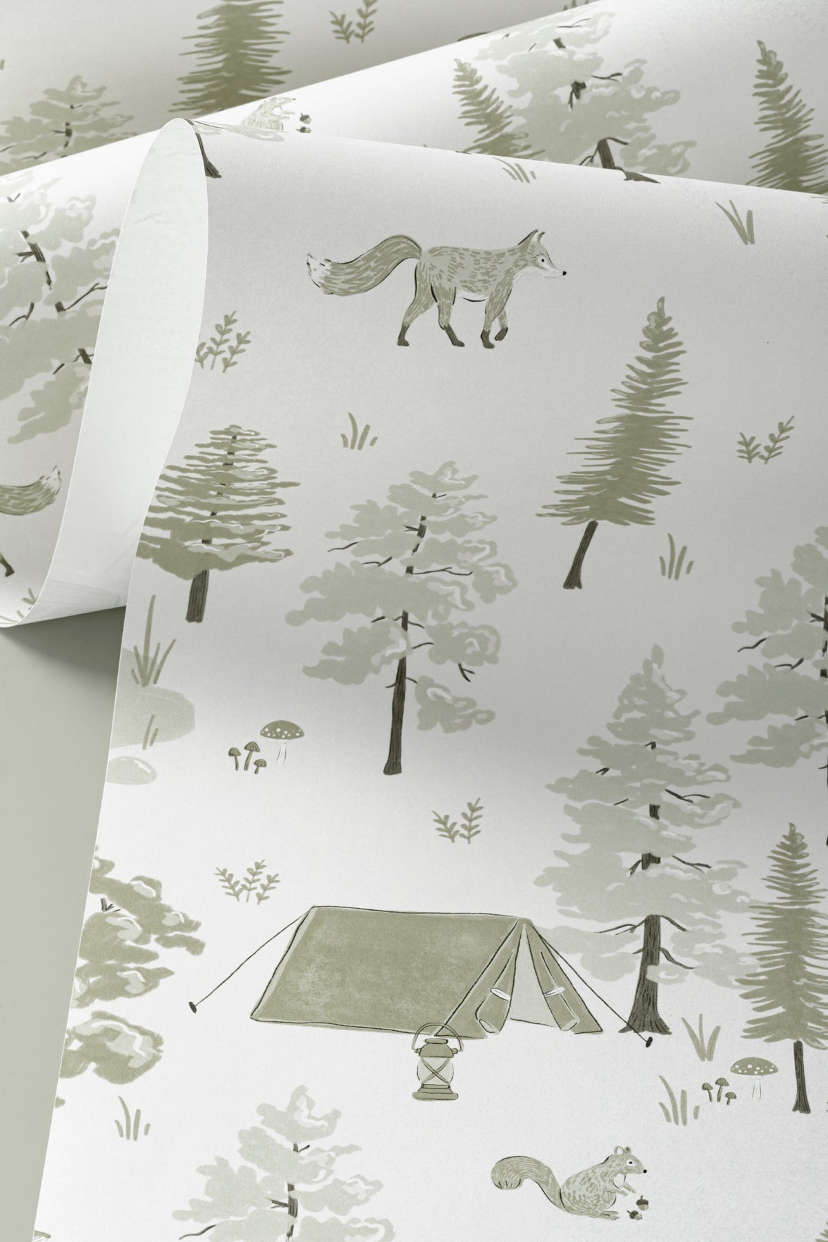 Angled detail of The Firelight Woods wallpaper in sage green
